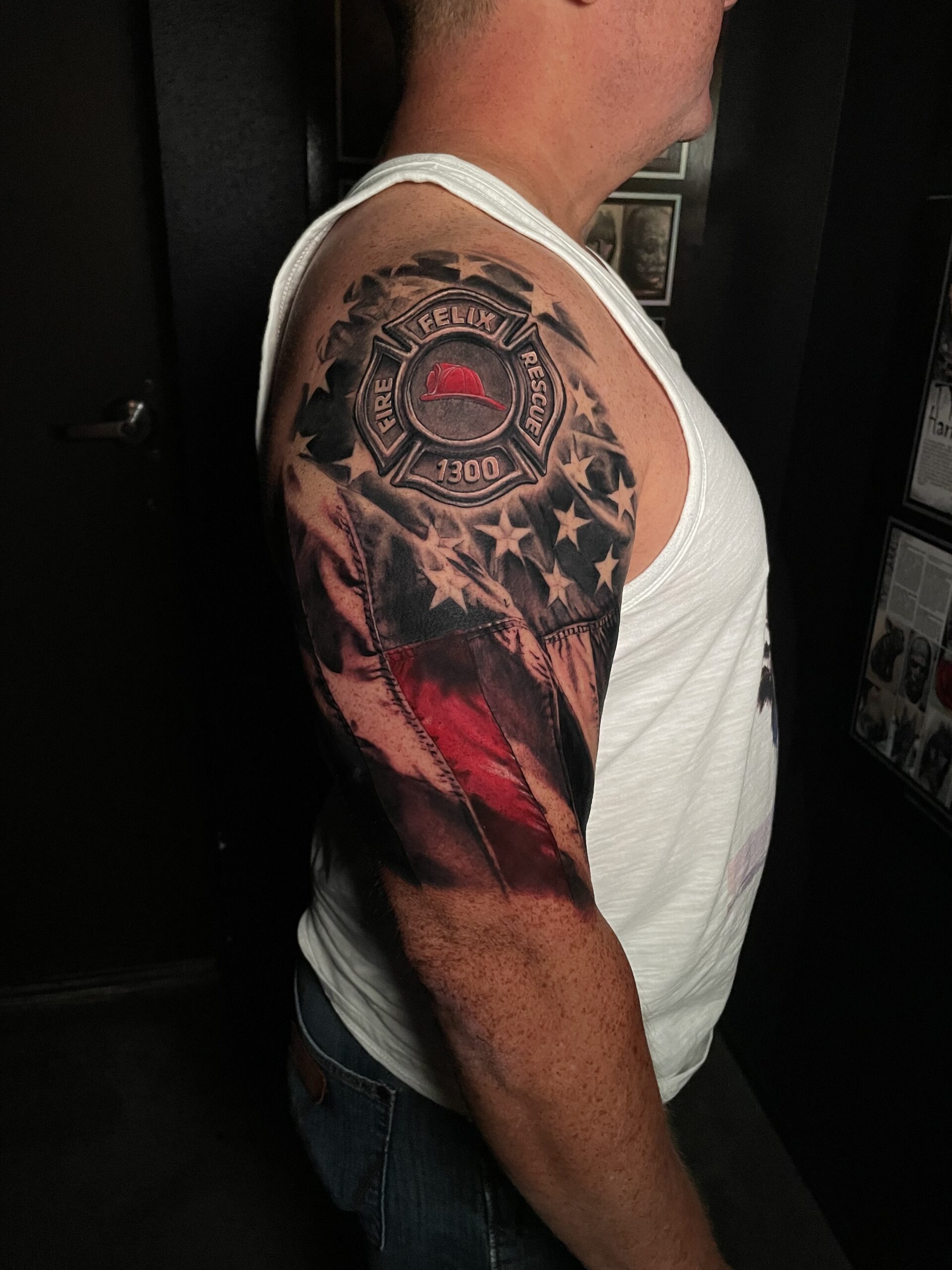 Firefighter symbol and American flag tattoo - a tribute to bravery and patriotism